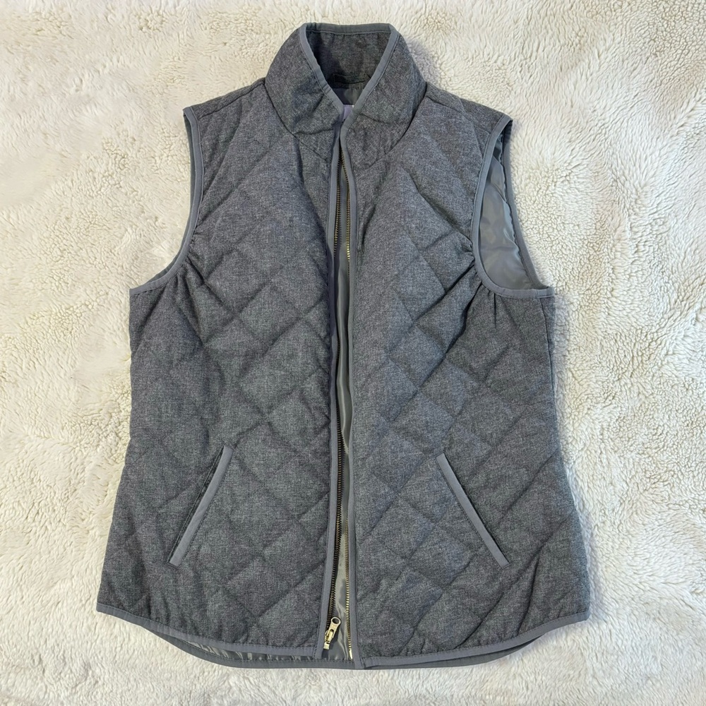 This is a thin, lightweight, soft shell vest with a silk interior lining